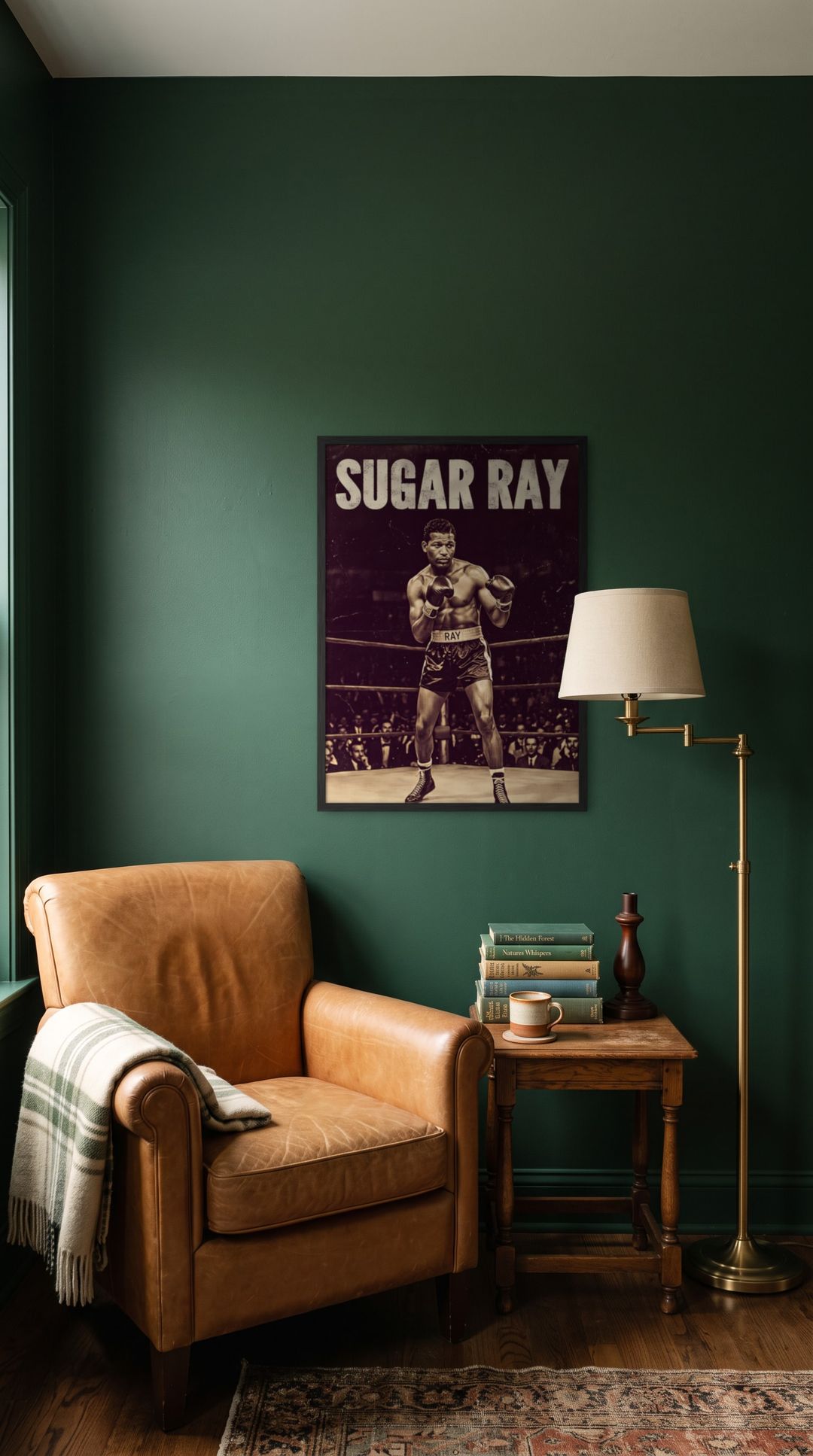 Sugar Ray, framed in black, in a cozy dark green reading corner