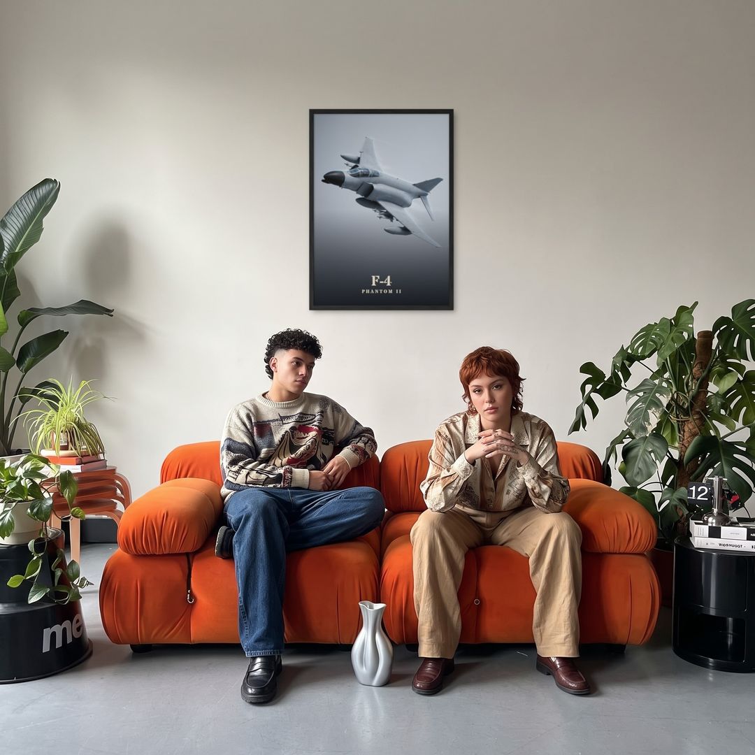 F-4 Phantom II, framed in black, in a retro orange sofa lounge