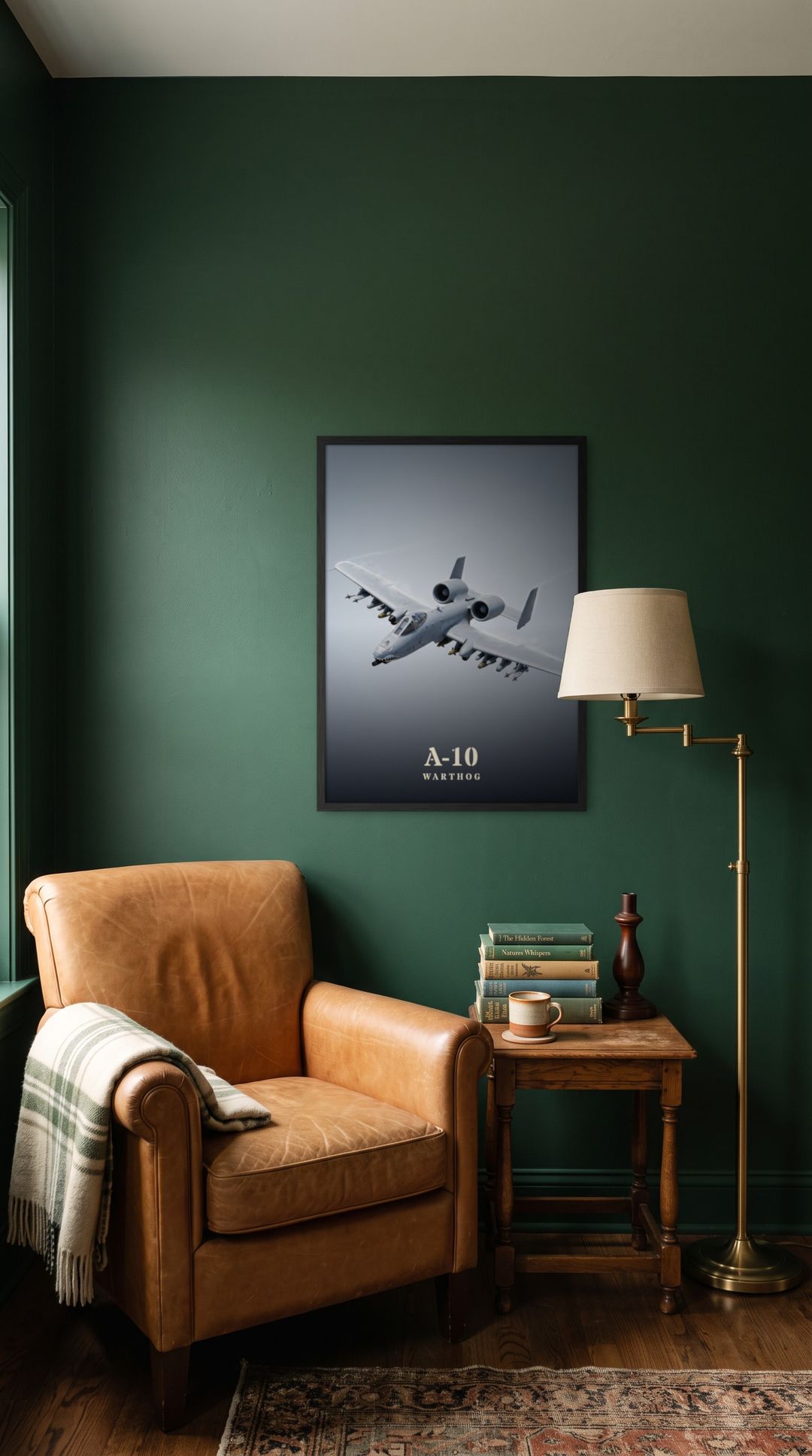 A-10 Warthog, framed in black, in a cozy dark green reading corner