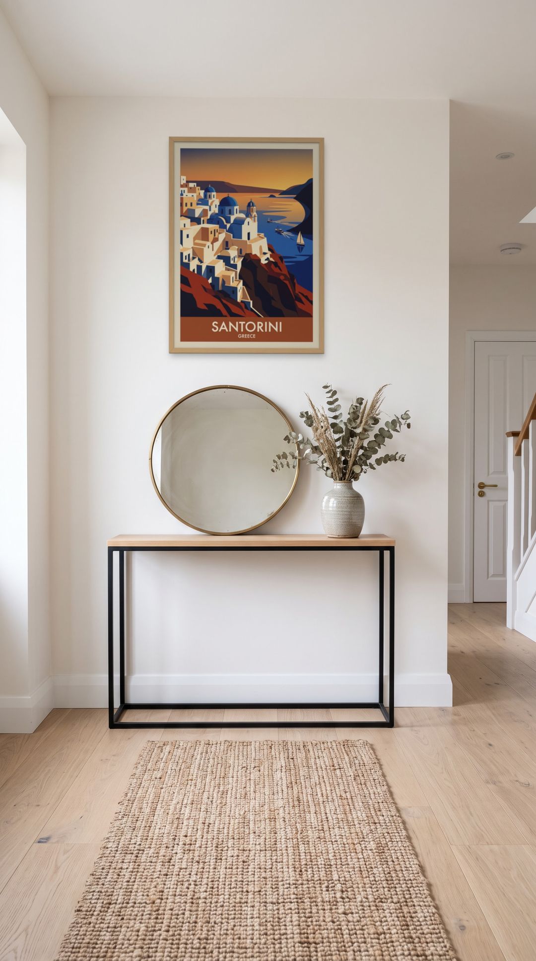 Santorini, framed in natural wood, in a minimalist entryway with wooden console
