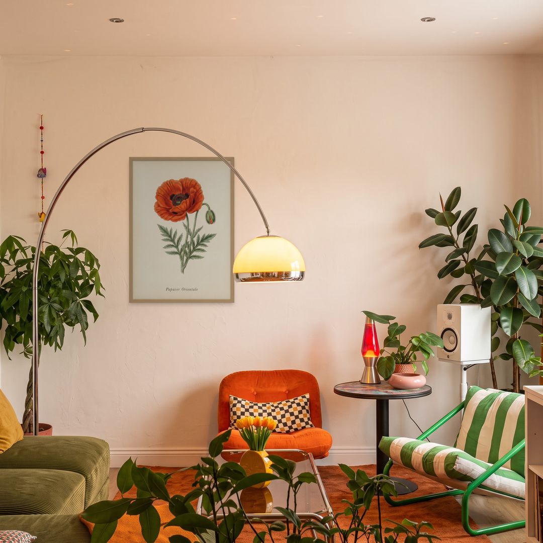 Oriental Poppy, framed in natural wood, in an eclectic mid-century living room