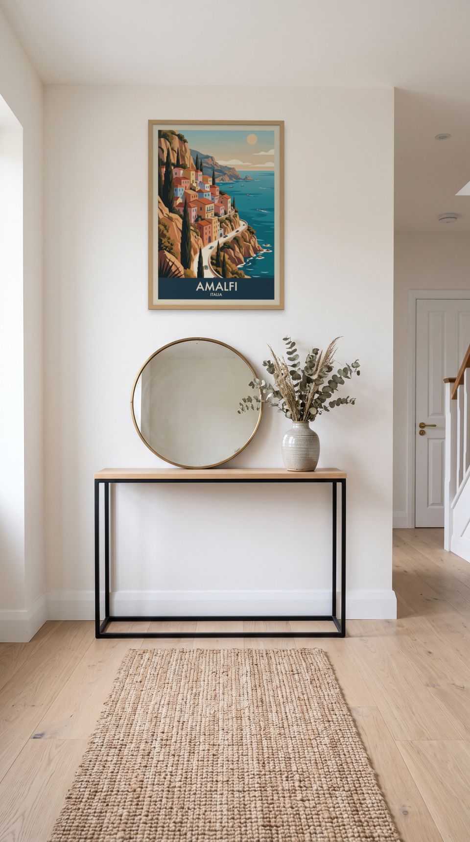Amalfi, framed in natural wood, in a minimalist entryway with wooden console