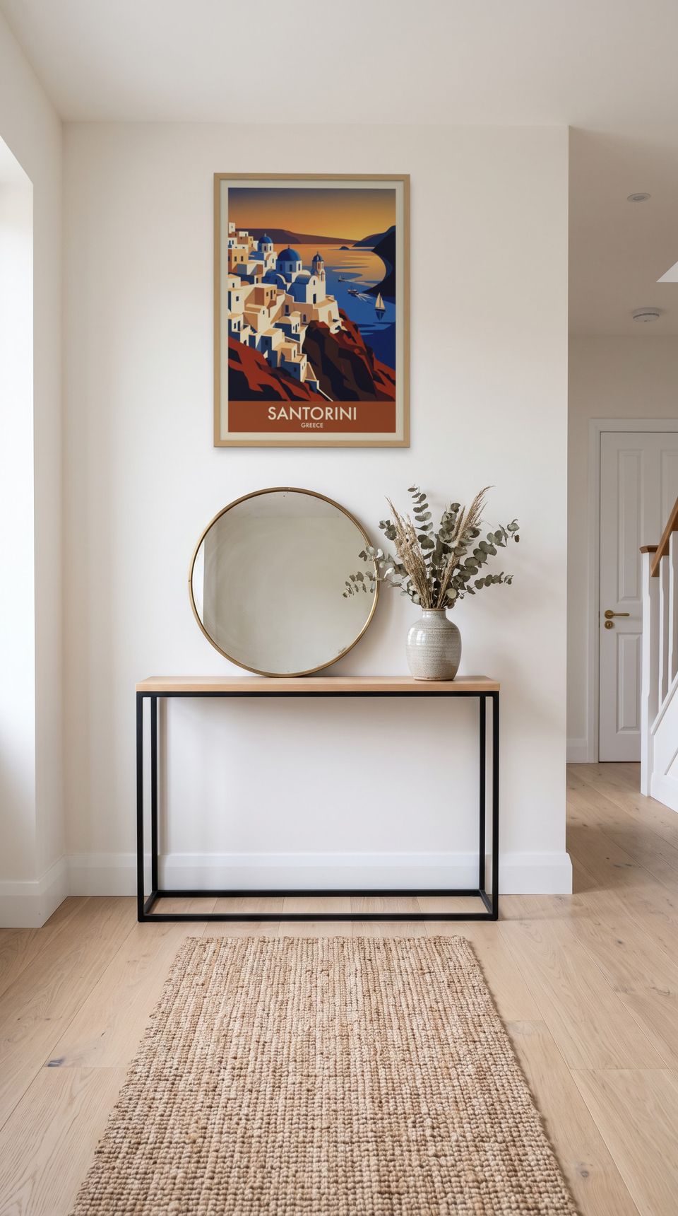 Santorini, framed in natural wood, in a minimalist entryway with wooden console